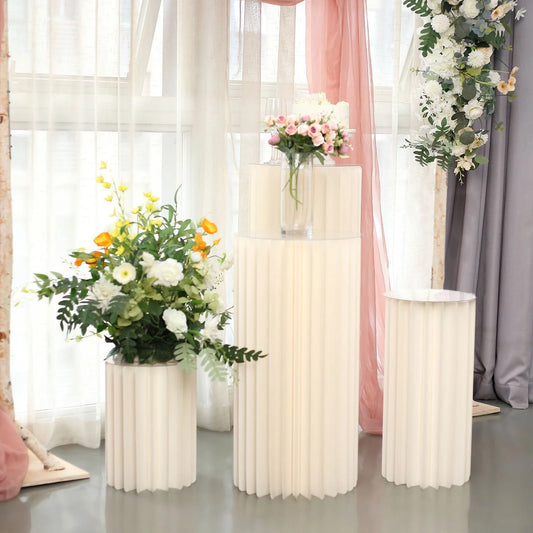Ivory Wavy Cylinder Plinths